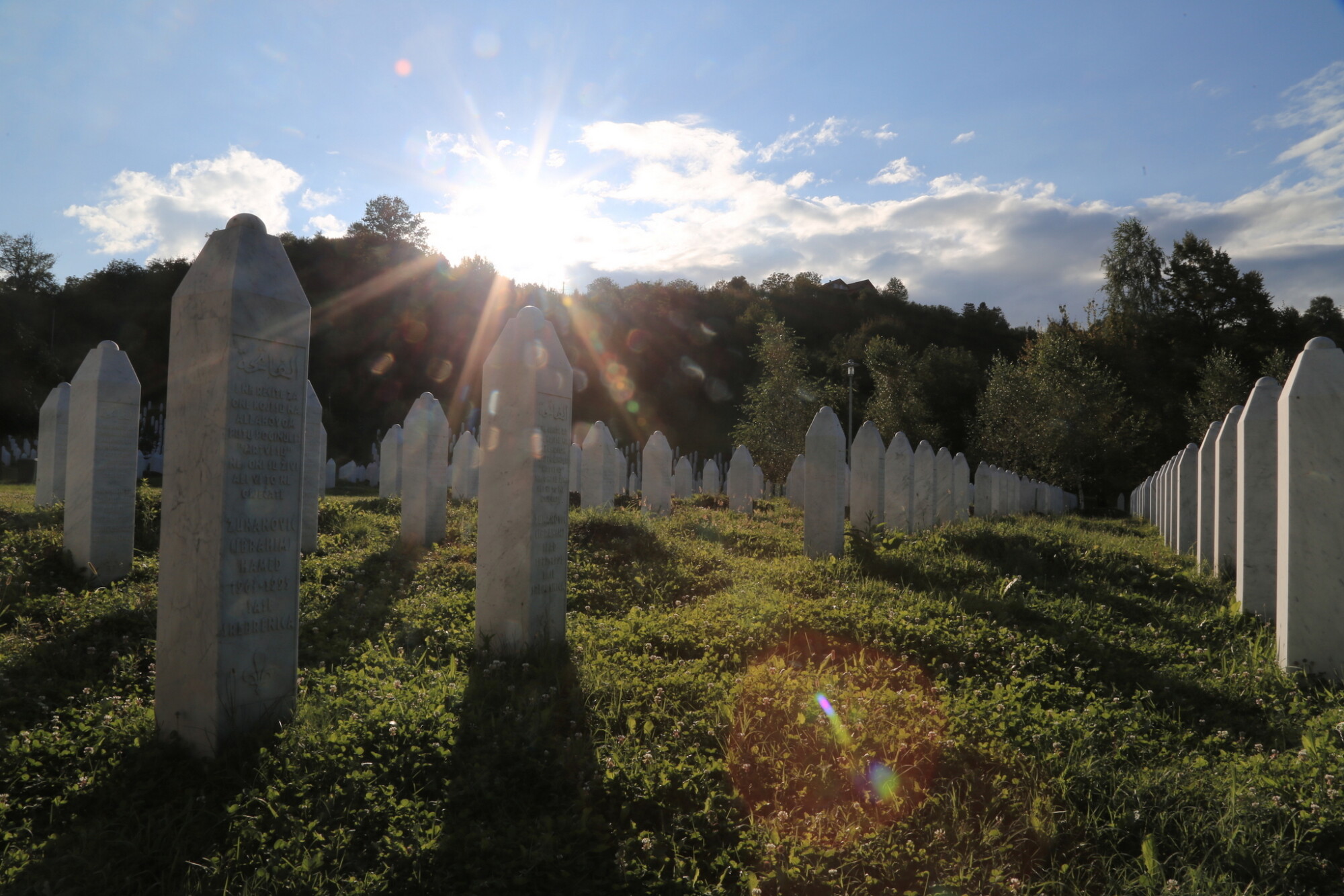Gravestones of thousands of victims at the Srebrenica genocide memorial