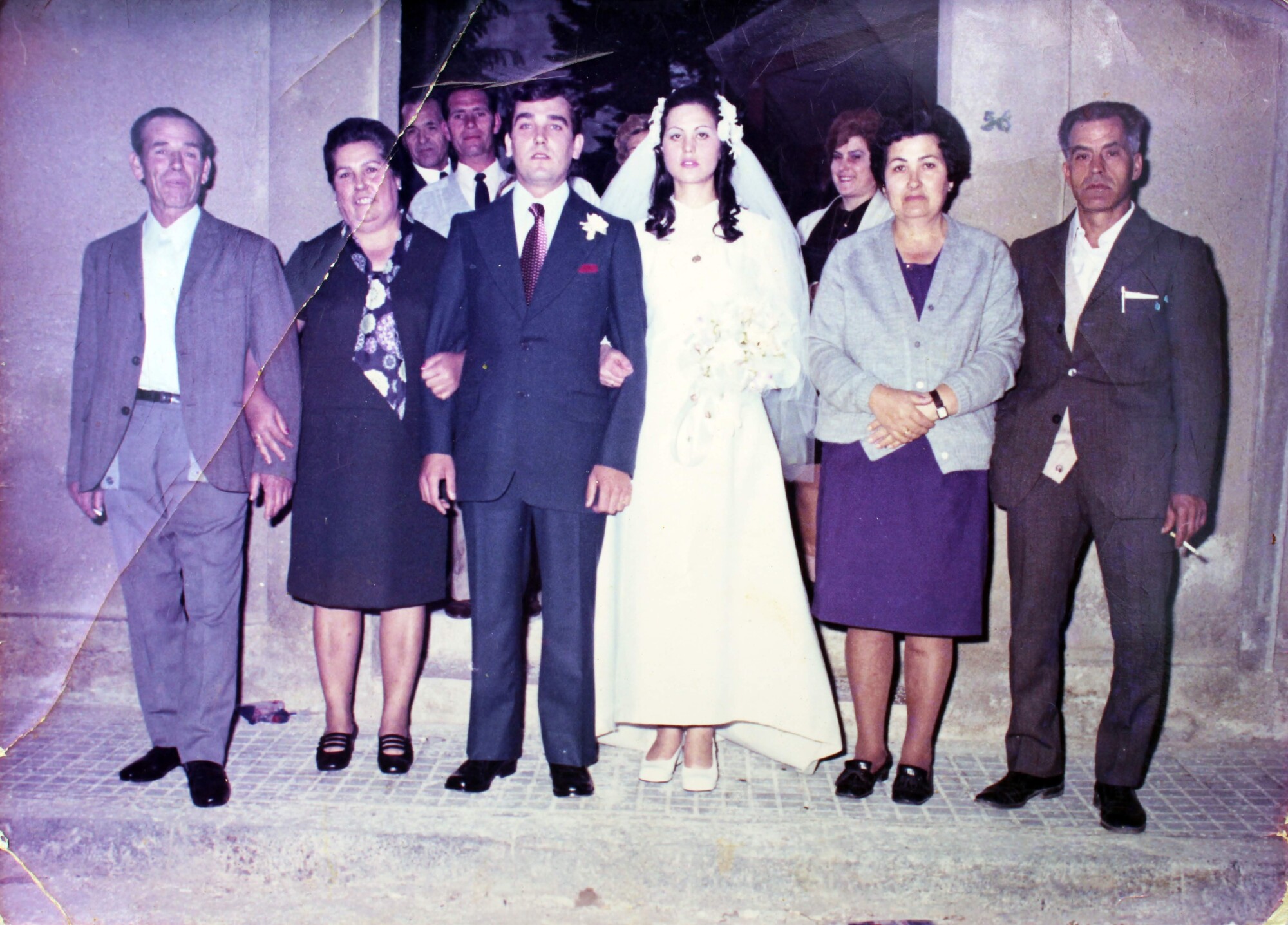 Photo of my aunt Carmen's wedding in 1971. From left to right: his husband's parents; his husband; my aunt Carmen; and her parents (my grandparents), María and Juan