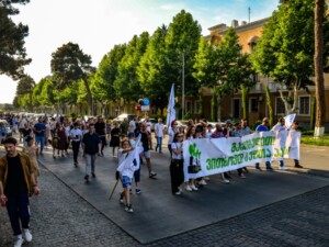 June 5, 2022 Protest in Rustavi, Georgia; text on the banner: “We Are Suffocating! We Demand Clean Air!"