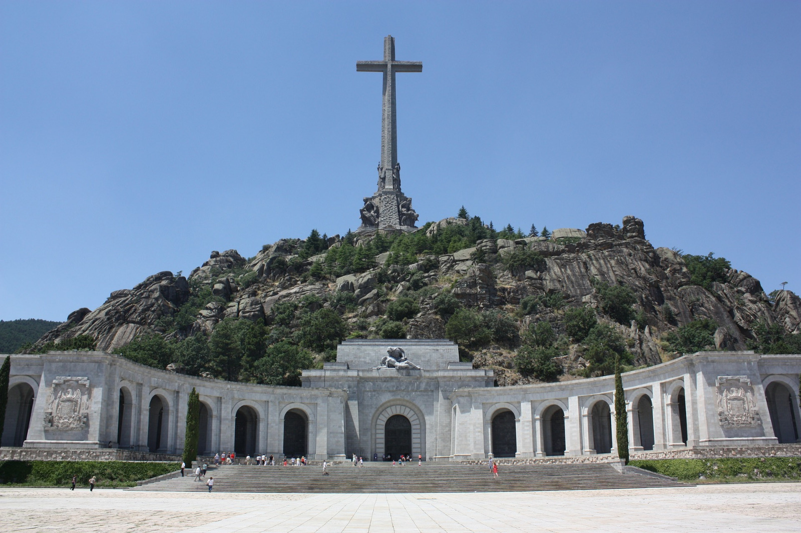 The scenery of the Valley of the Fallen, a monument built to honour the remnants of Franco and his allies. It's a sanctuary built on a hill with a Christian Cross on top.